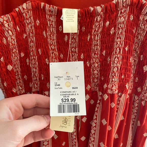 Red jumpsuit with white pattern - Picture 3 of 3